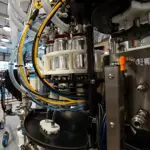 Štvorhlavová plnička plechoviek so zatváračkou CP-4 