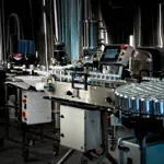 Štvorhlavová plnička plechoviek so zatváračkou CP-4 